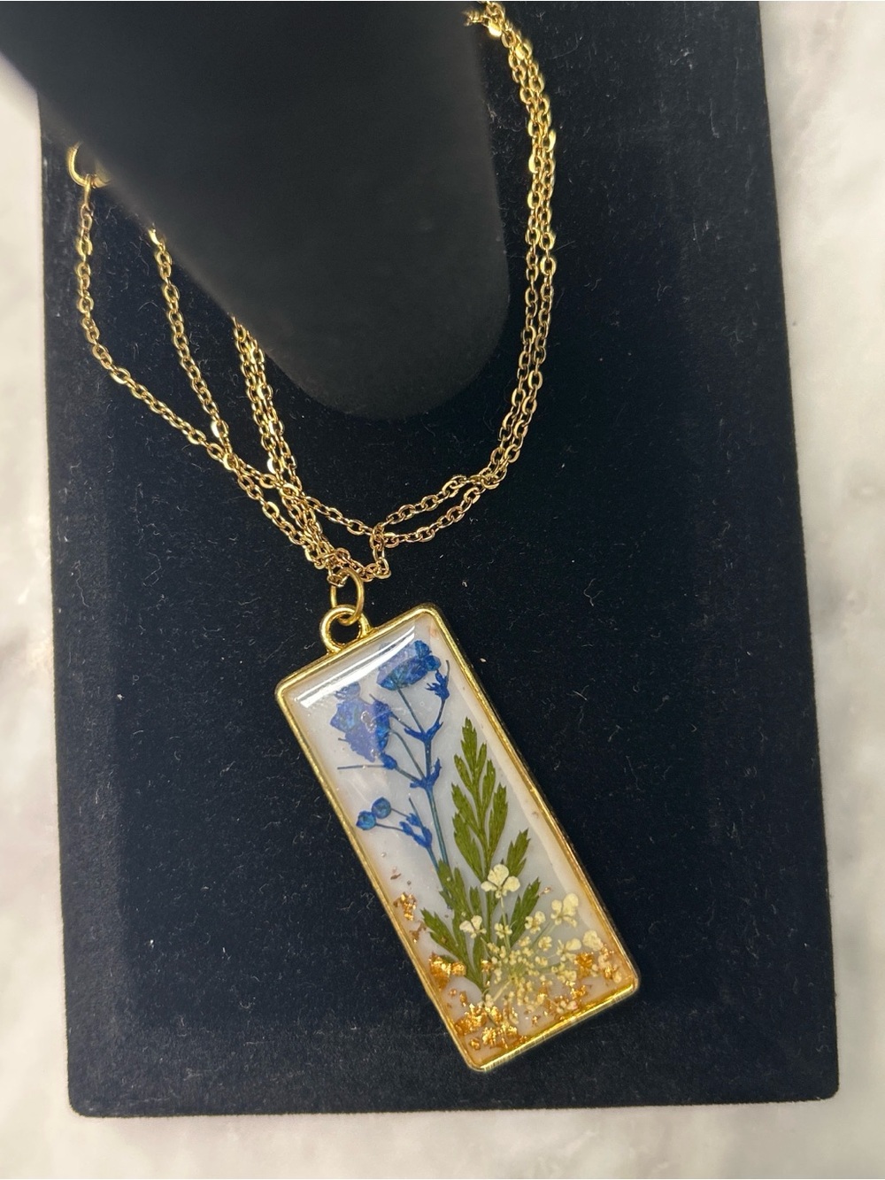 Handmade brand new.Gold-tone Rectangular Pendant Necklace with Blue Floral Inlay